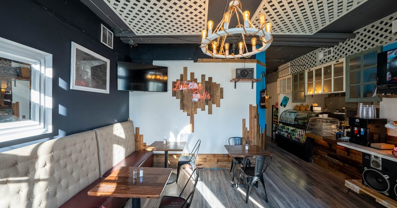 Decorated interior, seating area, TV on the wall