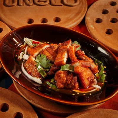 Crispy pork with herbs.