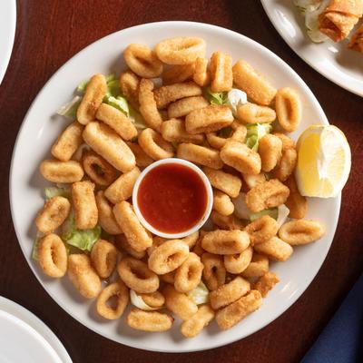 Fried calamari with marinara sauce.
