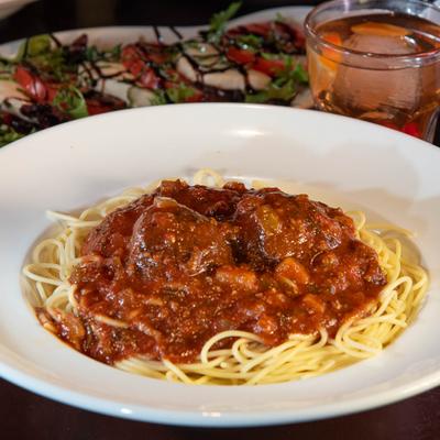 Spaghetti and meatballs in a tomato sauce.