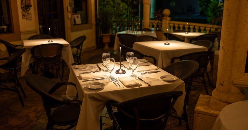 Interior, table set for guests in dining area