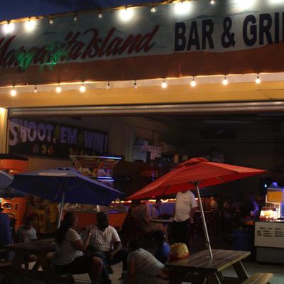 Restaurant exterior at night.