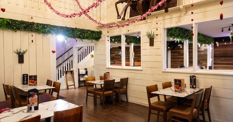 Interior, tables and chairs ready for guests