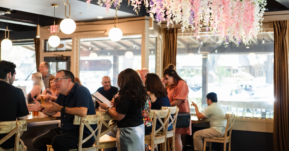 Customers sitting at the bar