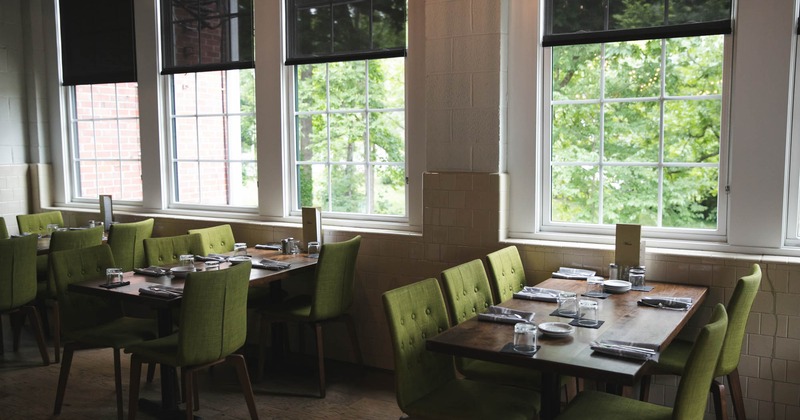 Interior, tables with chairs ready for guests