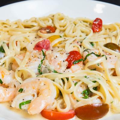 Champagne shrimp with linguine, tomato, basil.