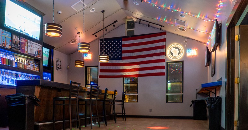 Interior, room for party, booths, usa flaf on the wall