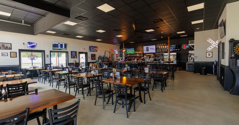 Interior, diner area, tables, chairs, wide view