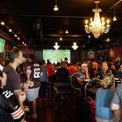 A big crowd of fans watching the game