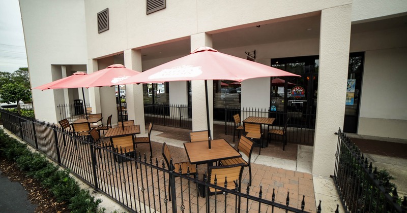 Exterior, tables, chairs and sunshade umbrellas