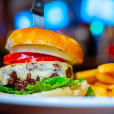 Classic burger served with golden fries.