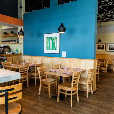 Modern dining area with set tables.