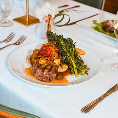 Grilled steak with broccolini and roasted peppers.