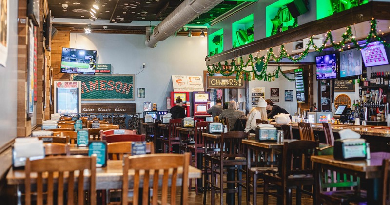 Interior, dining area with few guests in the back