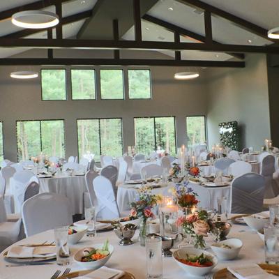 Banquet room set up for an event, likely a wedding reception.