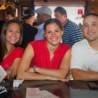 Three guests posing for a photo