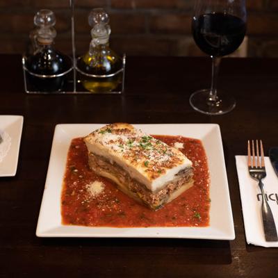 Lasagna with tomato based sauce.