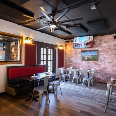 Interior, dining area, tables and banquette seating