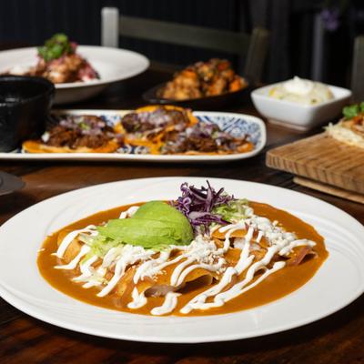 House made Mole Tia at 13 Tacos & Taps.