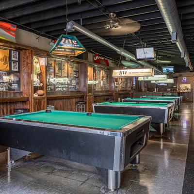 A room with pool tables.