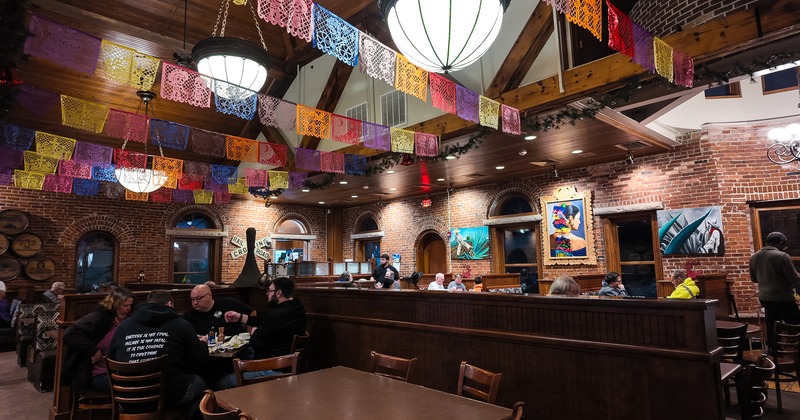 Spacious dining area with guests enjoying their food