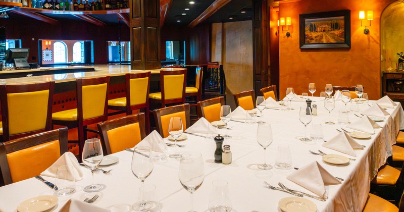 A large dining table ready for guests