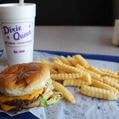 Cheeseburger served with fries and drink.