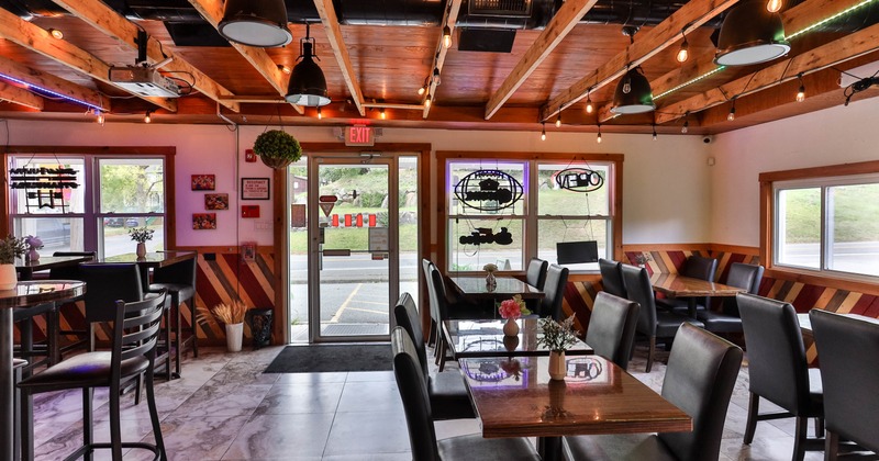 Interior, tables and chairs ready for guests