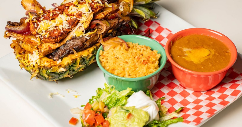 Pineapple fajitas served with rice and refired beans