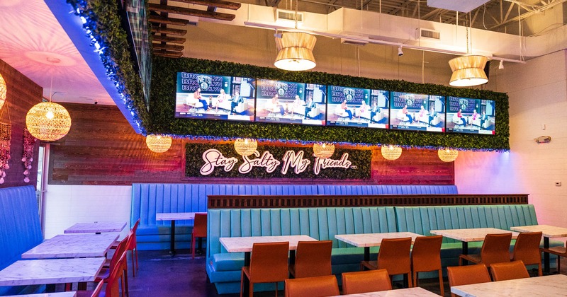 Interior, tables, chairs, lighting, LED screens