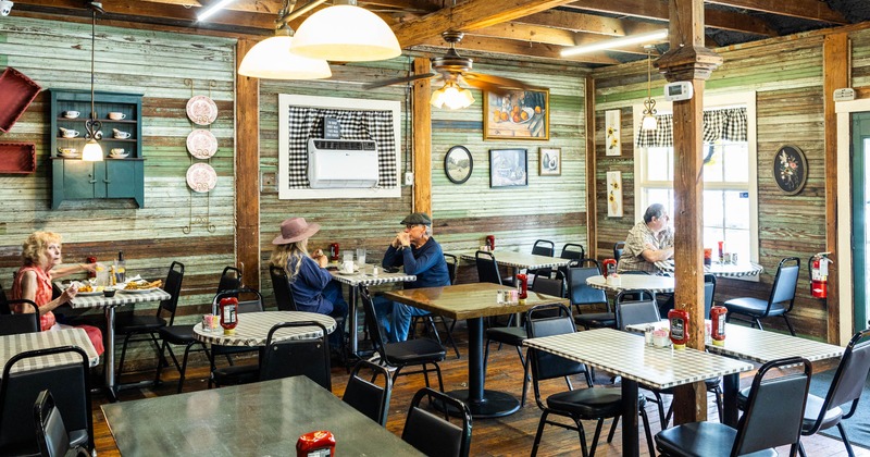 Interior, tables and chairs ready for guests