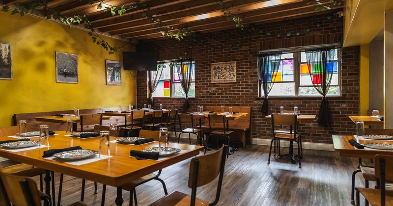 Interior, seating area with tables and chairs