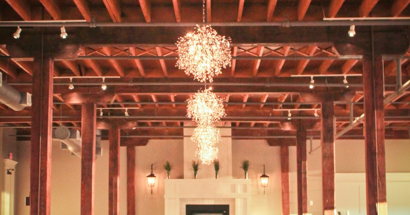 Interior, tables with bar stools, and the large bar on the left