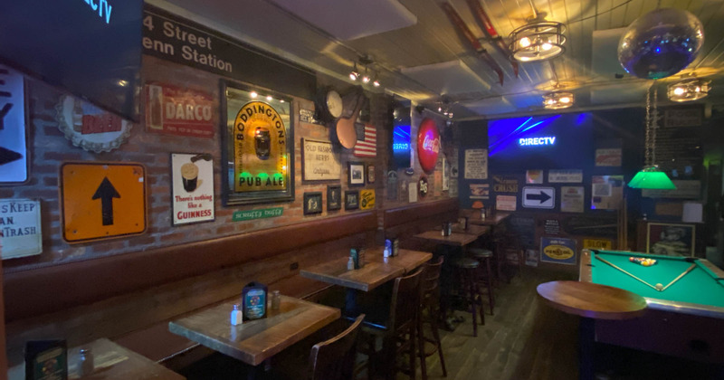 Interior, dining tables on the left, pool table on the right