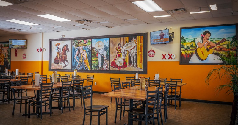 Interior dining area with tables and chairs