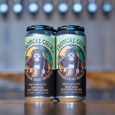 Two cans of tropical chimp beer.