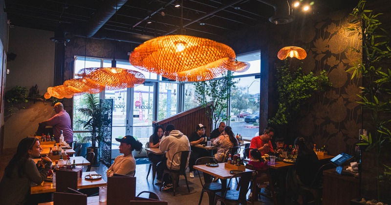 Interior, dining area, tables and chairs, guests sitting