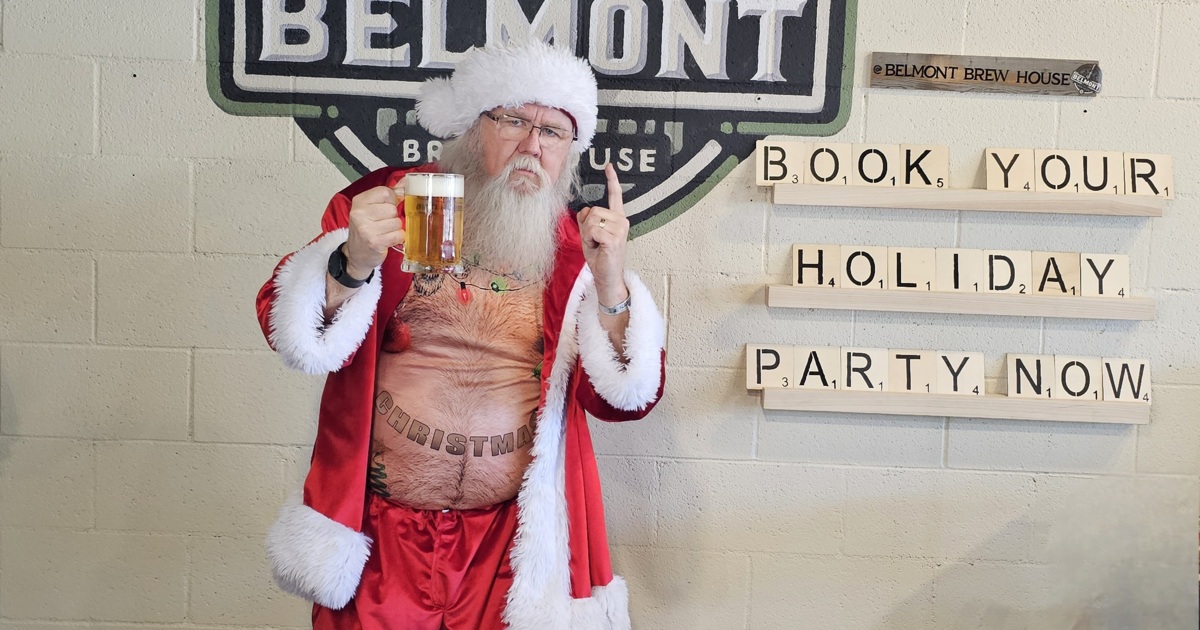 Bad Santa  pointing at the book now sign