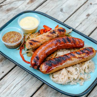 Sausage platter, served, side view.