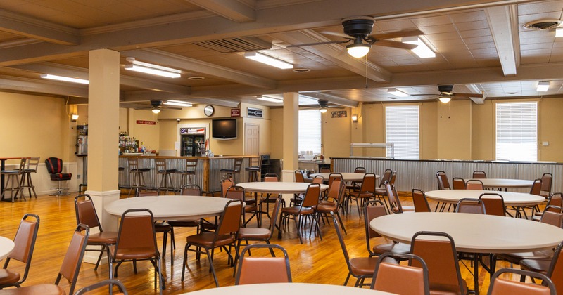 Interior, dining area with big white tables