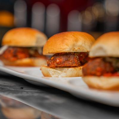 Trio of Meatball Sliders, side view.