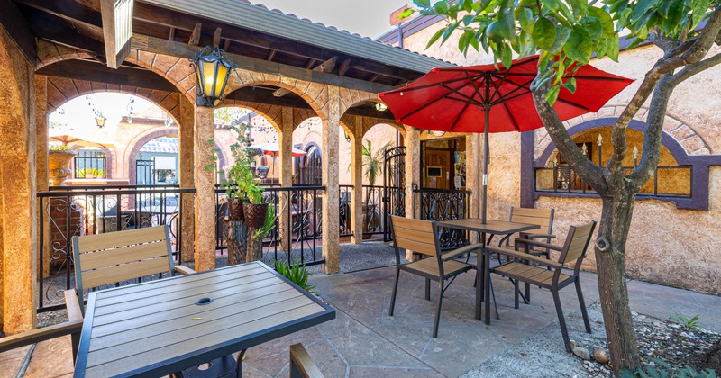 Exterior, tables, chairs and sun umbrellas