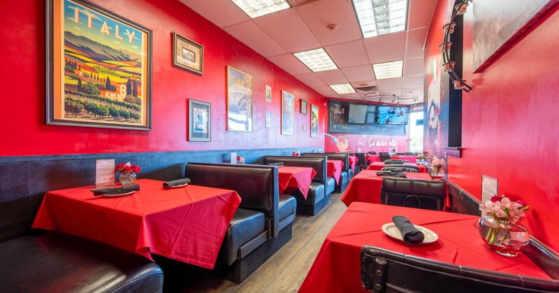 Interior, seating area with booths, chairs and tables