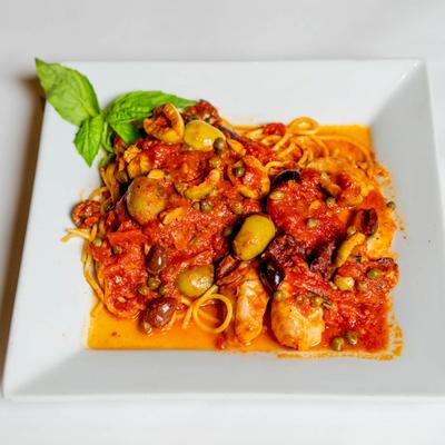 Grouper fillet, sauteed with capers, green and black olives, garlic, marinara sauce, and pasta.