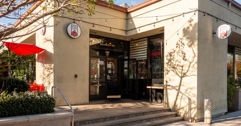 Exterior, front view to restaurant staircase, entrance
