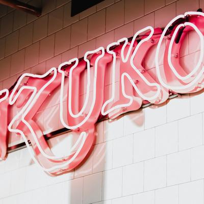 The restaurant's name in neon lights.