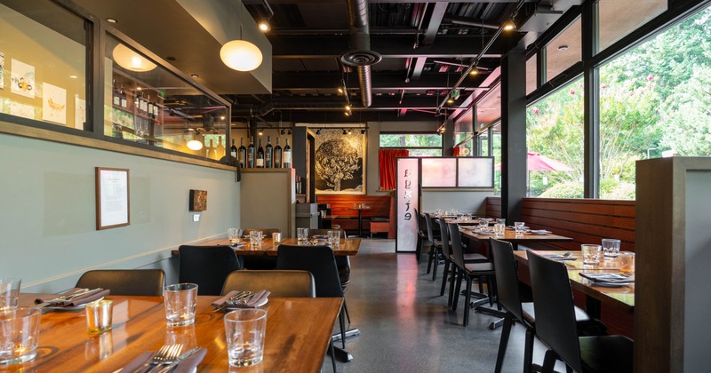 Interior, tables with chairs waiting for the guests