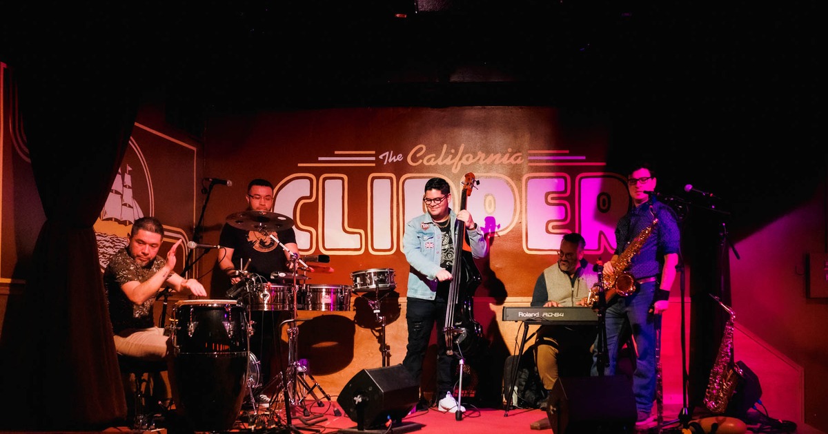 Band performing onstage