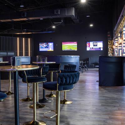 Seating area, high tables and chairs.