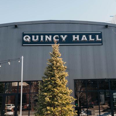 Quincy Hall front entrance, spruce tree.